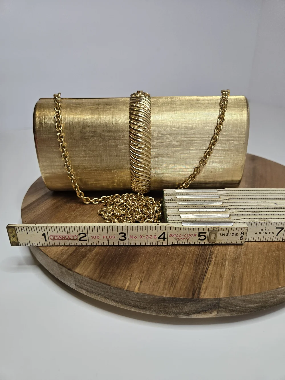 Rodo Gold Metallic Cylinder Clutch with Chain